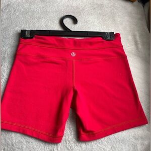 Red Lululemon shorts